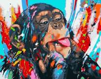 Веселый шимпанзе кривляется